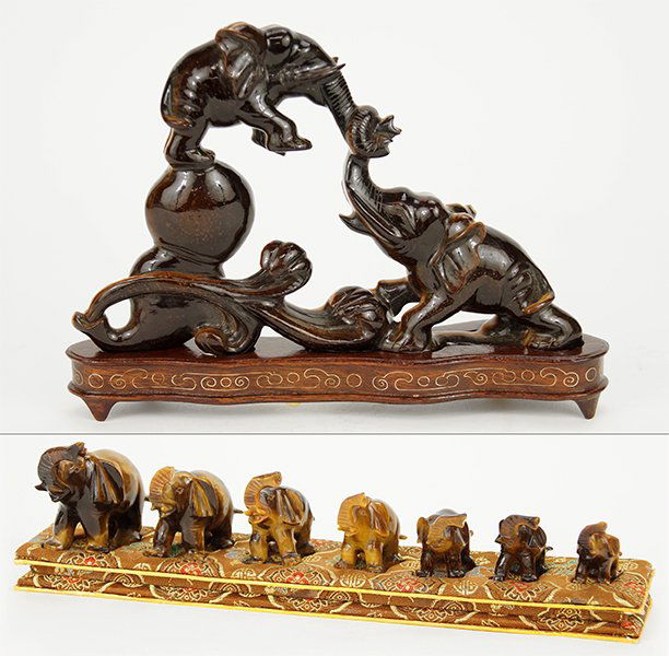 A Carved Tiger's Eye Figural Group. (1 of 1)