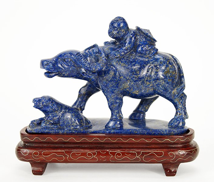 A CArved Lapis Lazuli Figural Group. (1 of 1)