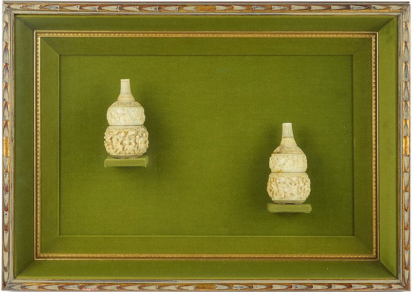A Pair of Chinese Carved Ivory Double Gourd Form Vases. (1 of 2)