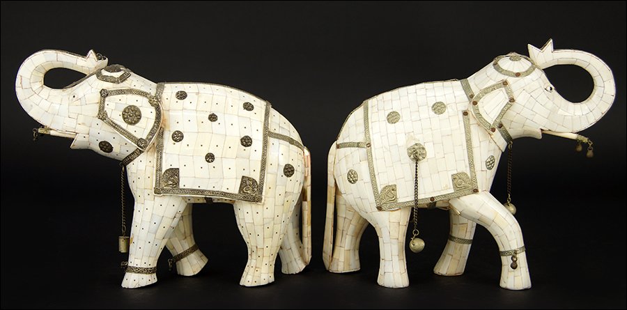 A Set of Two Bone and Ivory Veneer Elephants.: A Set of Two Bone and Ivory Veneer Elephants. With embossed metal embellishments Each: 7.5" x 8.5" x 2"