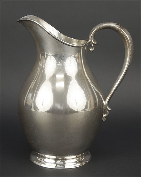 A Reed & Barton Sterling Silver Water Pitcher. (1 of 5)