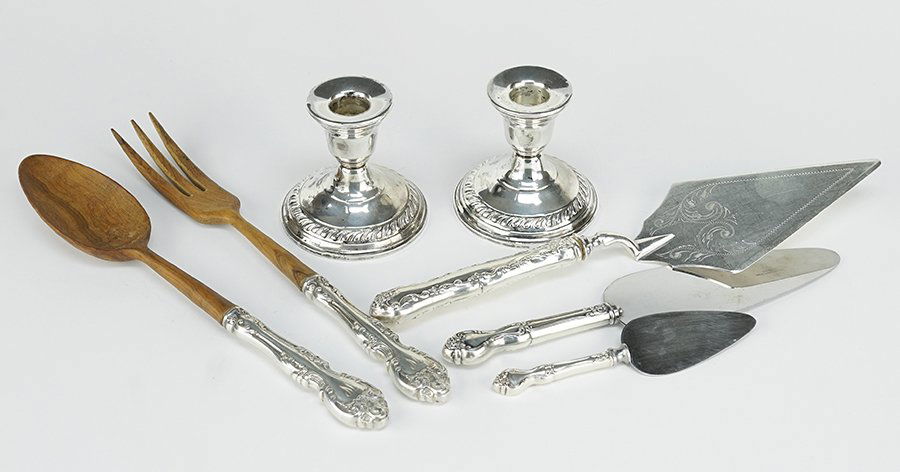 A Pair of Weighted Sterling Silver Low Candlesticks. (1 of 1)