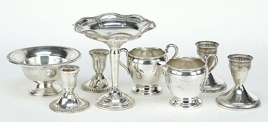 A Collection of Weighted Sterling Silver Table (1 of 1)