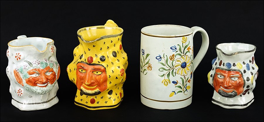 Three Staffordshire Pottery Face Jugs. (1 of 1)