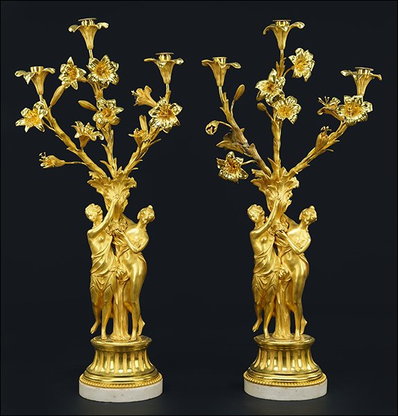 A Pair of French Gilt Metal Figural Three-Light (1 of 1)