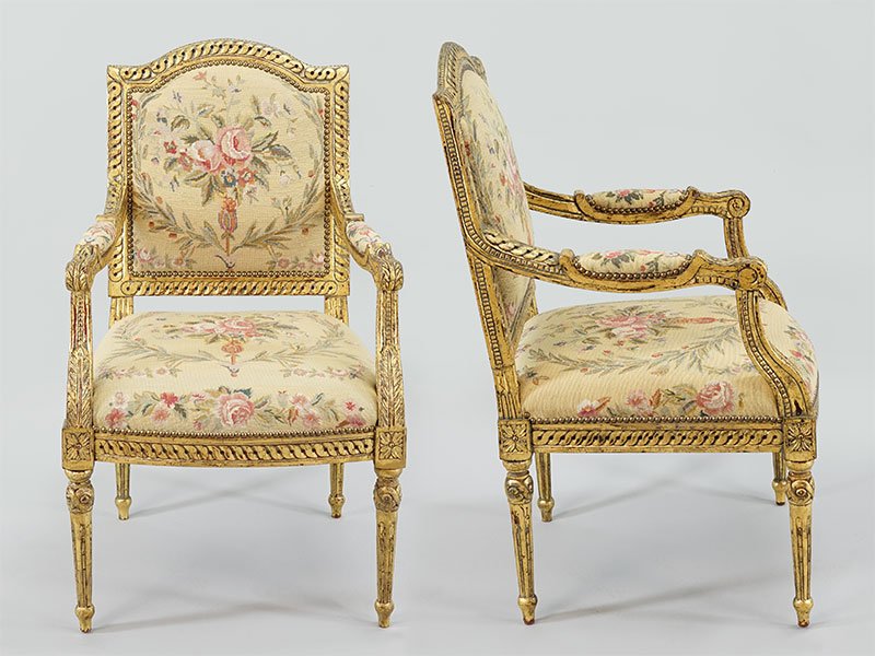 A Pair of Giltwood Open Armchairs.: A Pair of Giltwood Open Armchairs. Upholstered in needlepoint floral fabric 41" x 22" x 25"