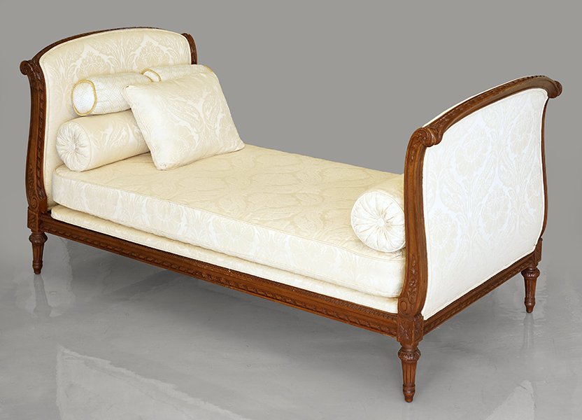 An Upholstered Mahogany Daybed.: An Upholstered Mahogany Daybed. 39.5" x 80" x 38"