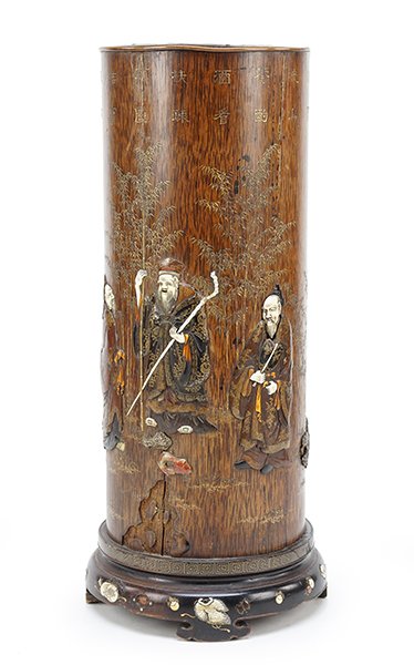 A Chinese Umbrella Stand.: A Chinese Umbrella Stand. Wood umbrella stand is inlaid with carved ivory, soapstone, mixed woods, and metal 21" x 9.5"