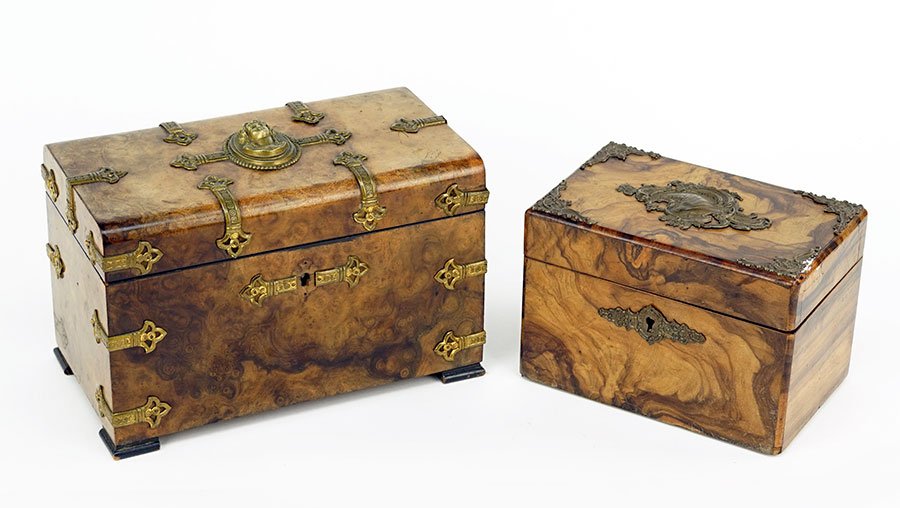 A Burlwood Tea Caddy.: A Burlwood Tea Caddy. Bearing ormolu mounts throughout the cover and body. Together with a smaller tea caddy (5" x 7" x 4") Burlwood tea caddy: 6" x 9.25" x 5"