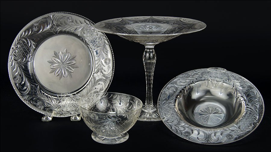 A Set of Etched Glass Dishes.: A Set of Etched Glass Dishes. Together with a pair of etched glass compotes, possibly Pairpoint. Comprising eighteen luncheon plates, eighteen soup bowls, and fifteen footed bowls Compote height: 7.5"