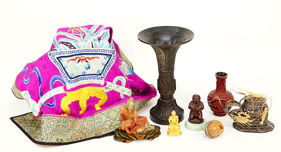 A Collection of Asian Decorative Items.: A Collection of Asian Decorative Items. Comprising an embroidered panel, a carved horn figural group depicting shrimp and crabs, a red laquered vase, a patinated metal vase, a soapstone figure, and ot