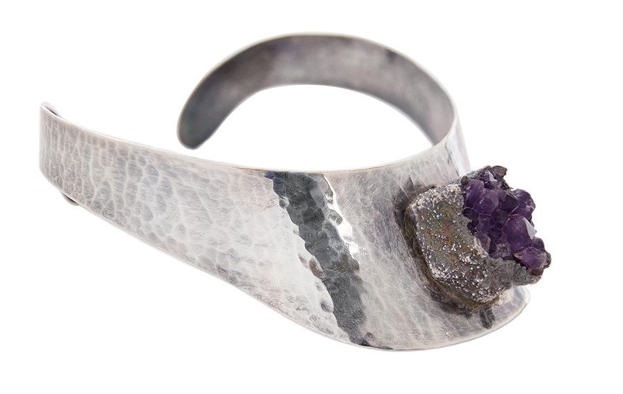 A Jacob Hull Danish Collar Necklace.: A Jacob Hull Danish Collar Necklace. Hammered metal collar necklace mounted with an amethyst geode at center. Reverse is stamped "J. Hull B+D Denmark"