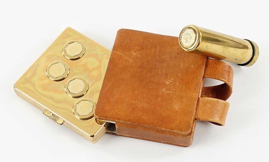 A Paul Flato Compact.: A Paul Flato Compact. Comprising a compact and lipstick with original leather case and Paul Flato box Leather case: .75" x 2.5" x 3"