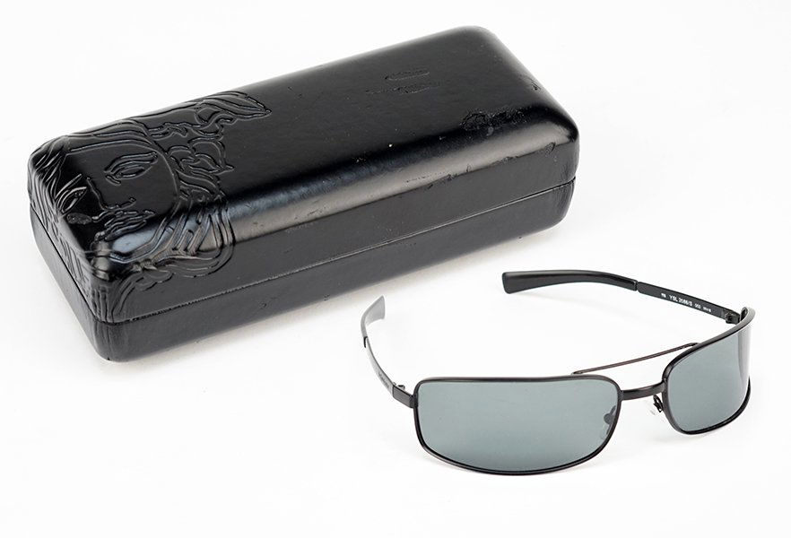 A Pair of Yves Saint Laurent Black Sunglasses. (1 of 1)