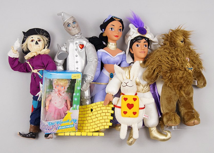Group of Disney Figures.: Group of Disney Figures. Consisting of Wizard of Oz figures, Aladin figures and a plush figure from Alice in Wonderland Height: 166