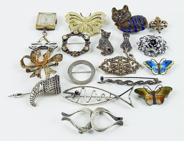 A Collection of Sterling Silver Brooches. (1 of 1)