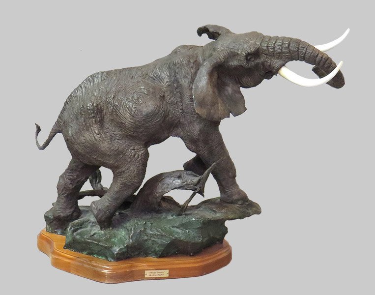 Laran R. Ghiglieri (American, Contemporary) African: Laran R. Ghiglieri (American, Contemporary) African Treasure. Bronze sculpture depicting an elephant. Numbered edition 56/125 24" x 34" x 15"