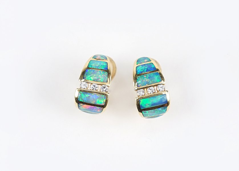 A Pair of Opal and Diamond Earclips. (1 of 1)