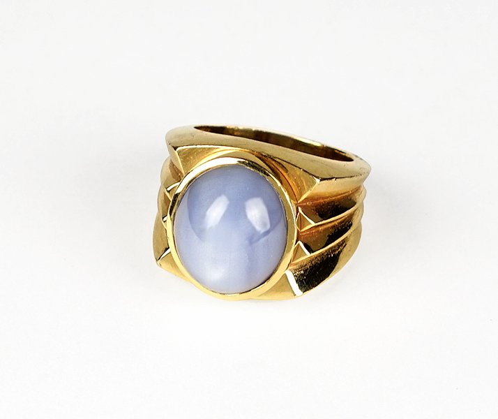 A Star Sapphire and 14 Karat Yellow Gold Ring. (1 of 1)