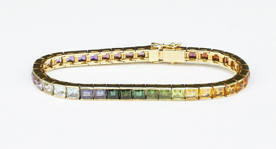 A Semi-Precious Stone and 18 Karat Yellow Gold Line (1 of 2)