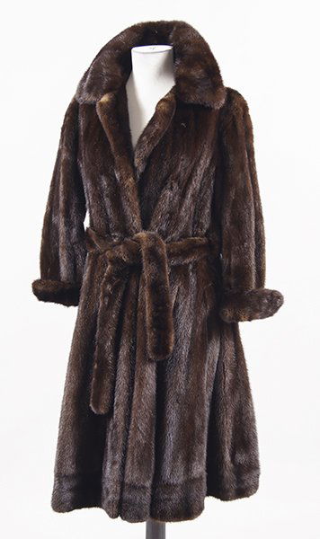 A Mahogany Mink Coat.: A Mahogany Mink Coat. 3/4 length coat with fold over cuffs and self belt Approximately a size 4-6