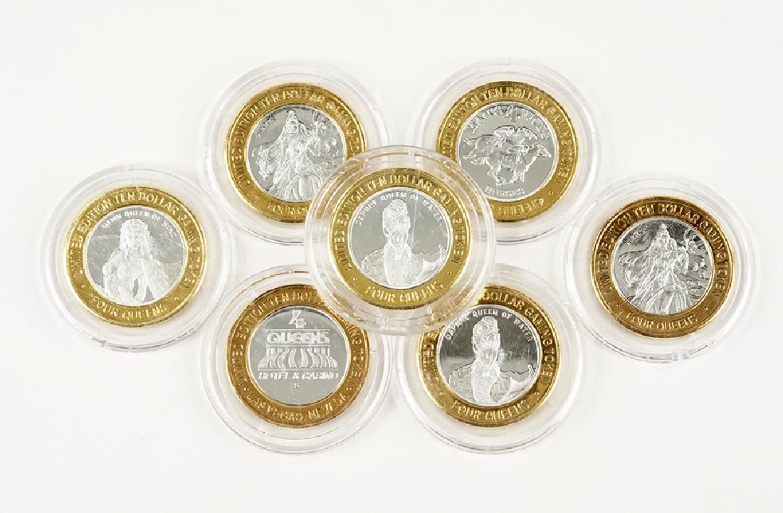A Collection of Seven .999 Silver 'Four Queens' Game: A Collection of Seven .999 Silver 'Four Queens' Game Tokens.