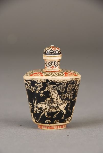 C19th Oriental painted ivory snuff bottle, decorated: C19th Oriental painted ivory snuff bottle, decorated with one figure riding a horse and his attendants in a winter landscape scene reserved against black ground, bearing four-character faux Qianlang m