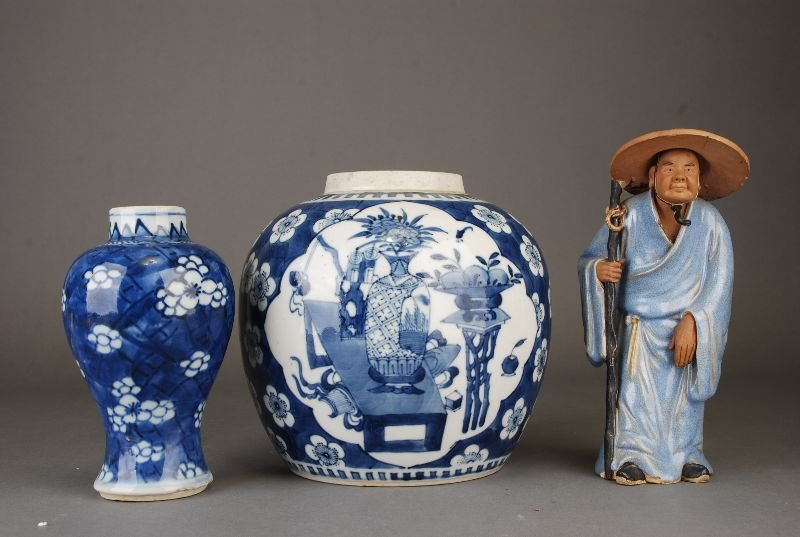 C19th Chinese blue and white ginger jar painted with: C19th Chinese blue and white ginger jar painted with panels of scholar's objects surrounded by prunus on ice-cracked ground, 17.5H & a blue and white 'prunus on cracked ice' vase; and a Shiwan figure.