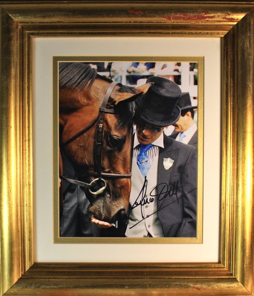 Frankie Dettori Signed Photograph: Frankie Dettori signed photograph. A signed 8" by 10" colour photograph. Framed in a high quality gold gilt frame D. 13" by 16"