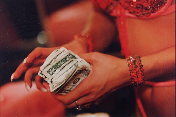 Lauren Greenfield: A Stripper Counts Her Money After A Performance At Cheetahs, Las Vegas, type c print, signed, AP/1, 11x14"