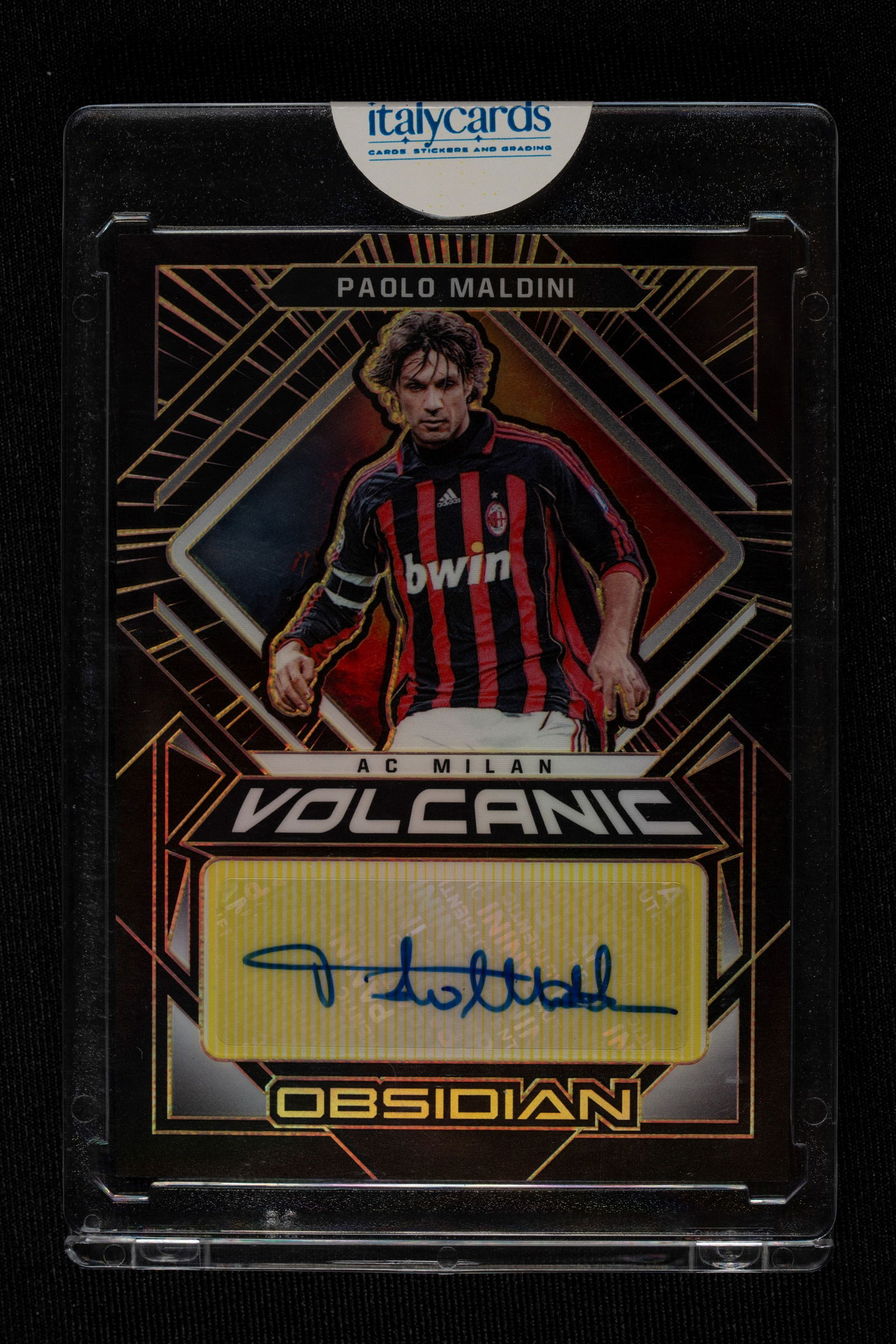 Paolo Maldini - Signed Card - AC Milan - Panini Obsidian 2021/22 - Numbered out of 10: Paolo Maldini's autographed card wearing an AC Milan jersey, published by Panini for the 2021/22 Obsidian series. Numbered out of 10. Paolo Maldini's history with AC Milan represents perhaps the fines