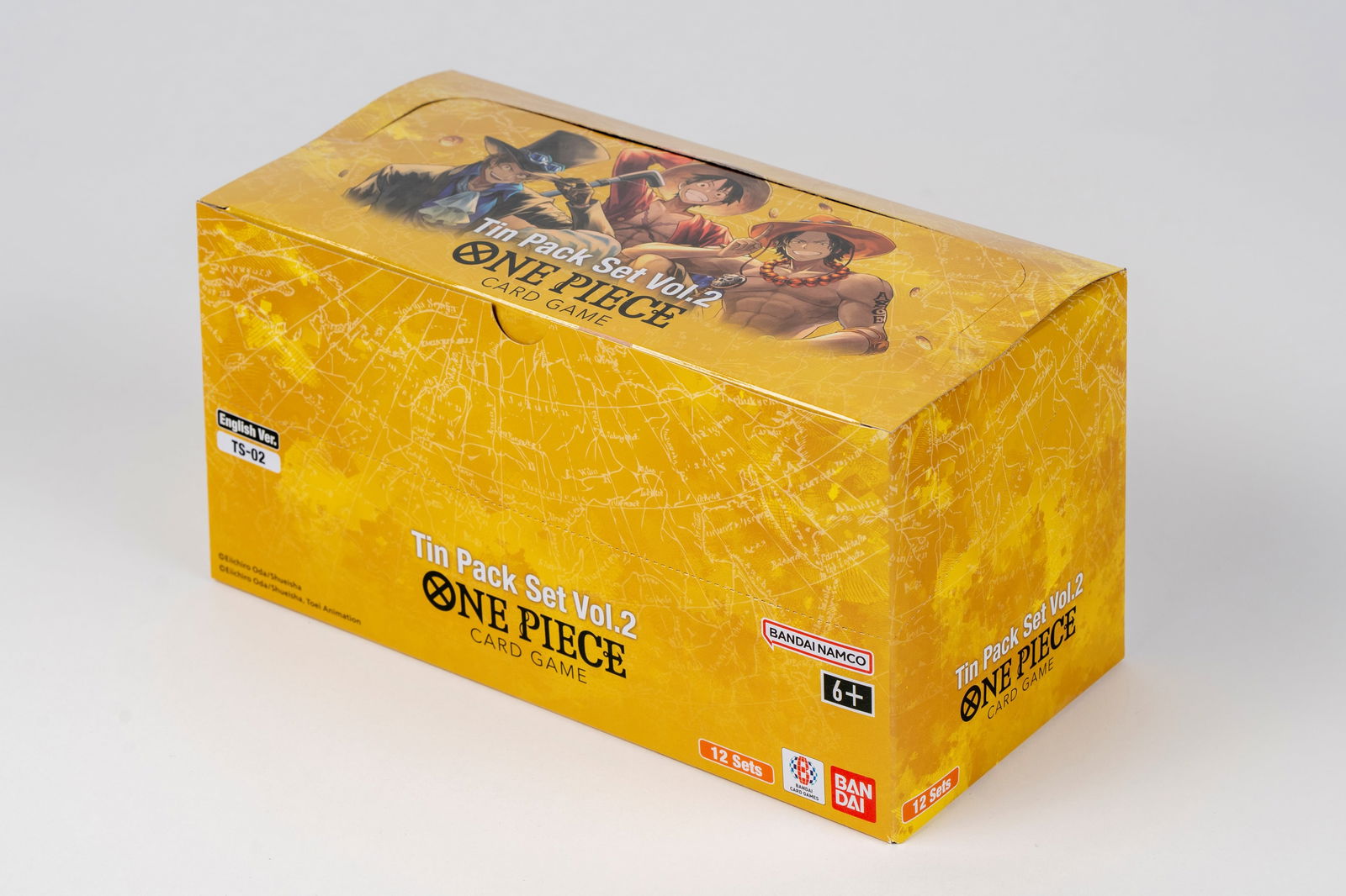 One Piece - Box Tin Vol.2 TS02 English - Sealed: The sealed box of Tin Vol. 2 in the English edition contains 12 tins (4x Luffy, 4x Ace, and 4x Sabo with their corresponding promos). The original box, preserved in excellent condition, exudes the int