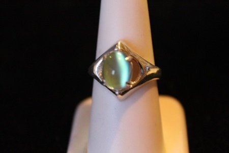 Unisex Rainbow Moonstone Solid Sterling Silver Ring: Unisex Rainbow Moonstone Solid Sterling Silver Ring, Moonstone approx 3.43ct, Clarity Very Transparent, Color Rainbow Green Blue Yellow Pink , Solid Sterling Silver approx 11.2 grams over 1/3 OZ. Heav