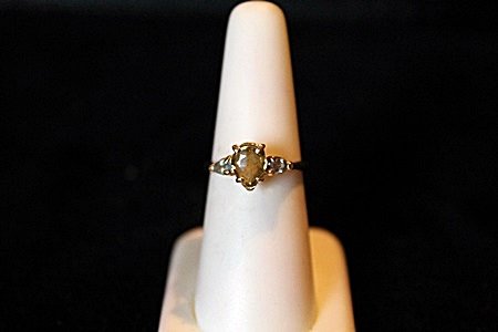 Solitaire Natural Alexandrite 14kt Ring GIA $16,250.00: Lady's Solitaire 1.17ct Fancy Pear Shape Natural Alexandrite, Clarity VVS Clean, Color Change Green to Orange, with accent side Alexandrite's Oval Facet, total carat weight .31ct,Clarity VVS Clean, Co