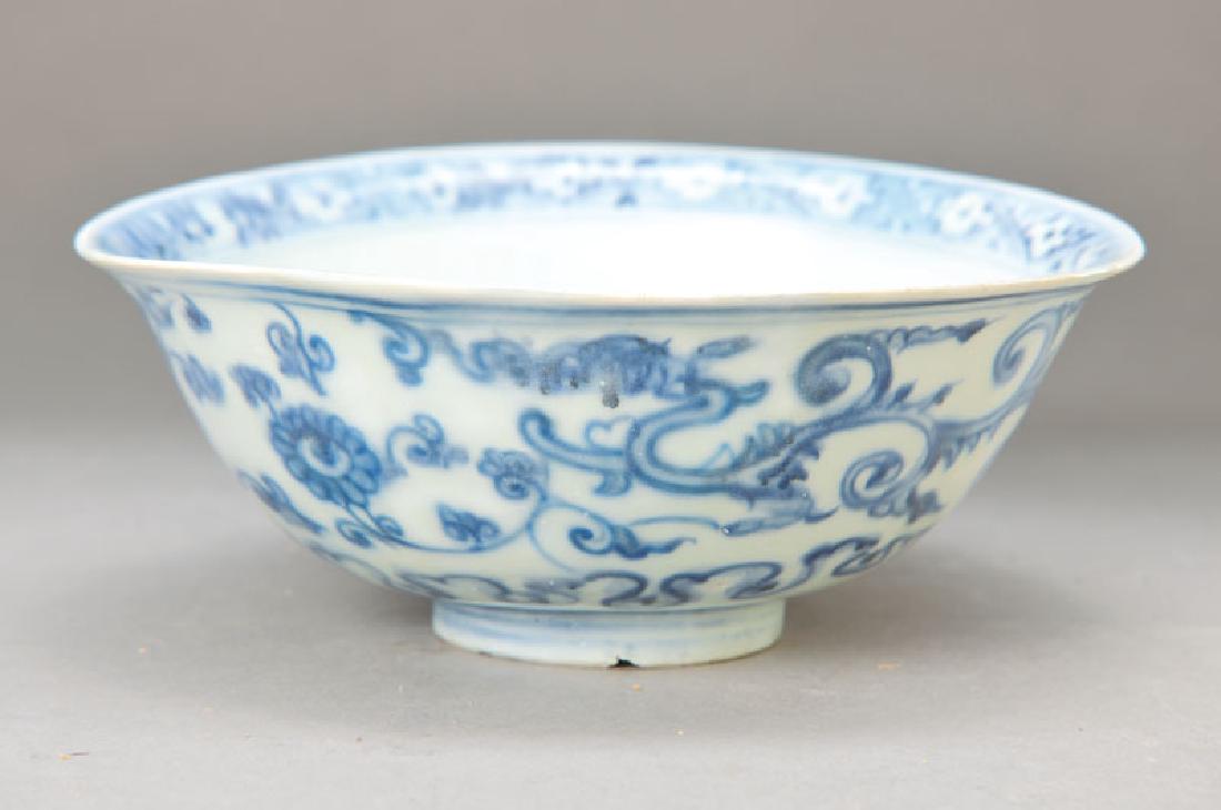 bowl, Transition: bowl, Transition, around 1650-1680, bluish glaze, blurred effect, circumferential Dragon motif, interior: Rosette with petals, edge in the way as the late Ming-period, in itself slightly contorted, fi