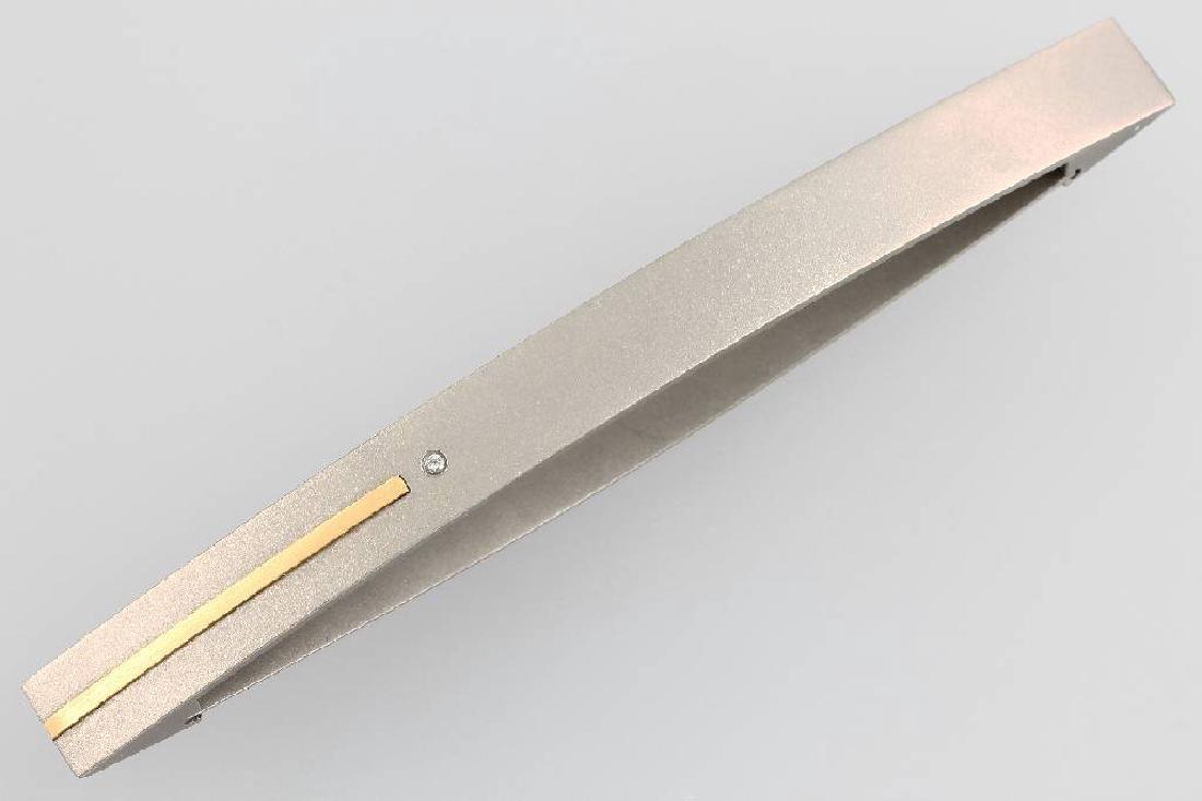 Hair clip with brilliant: Hair clip with brilliant , titanium and YG 750/000, manufacturer's brand THEO MEISTER, 1 brilliants approx. 0.02 ct Top Wesselton/vs, l. approx. 11 cm