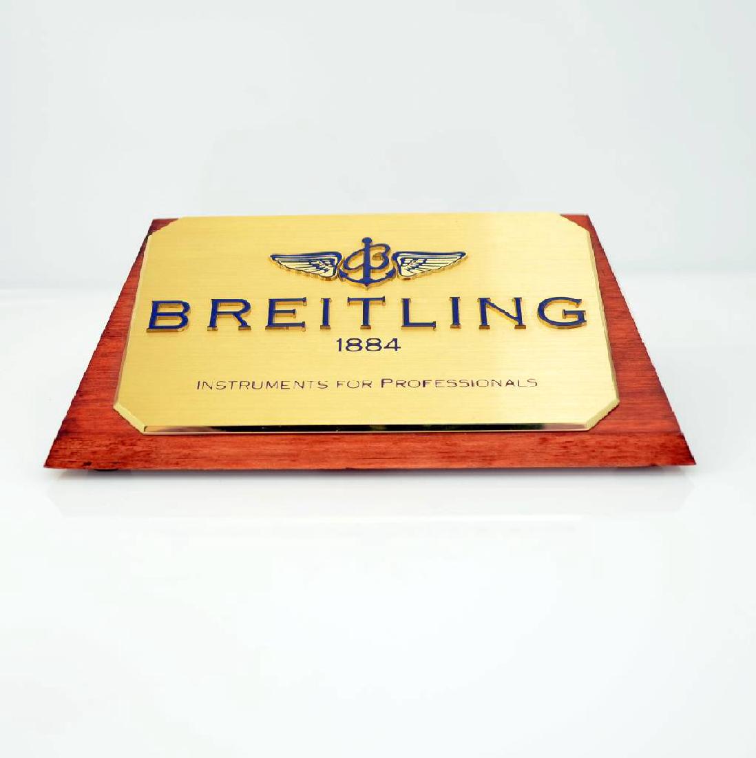 Set of 3 Breitling advertising signs: Set of 3 Breitling advertising signs, 1 x wooden base with brass plaque, console type, 2x acrylic glass, to be sold without reserve