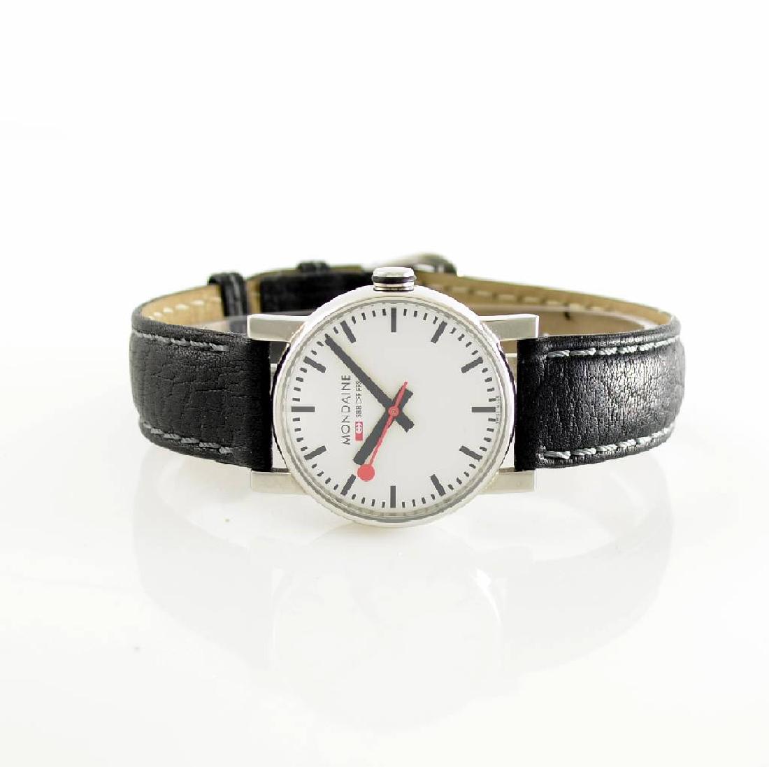 MONDAINE Railways wristwatch, Switzerland around 1995: MONDAINE Railways wristwatch, Switzerland around 1995, two-piece construction, on both sides glazed stainless steel case, snap on case back, dial & hands like a Swiss station clock, 25 jewels, calibre