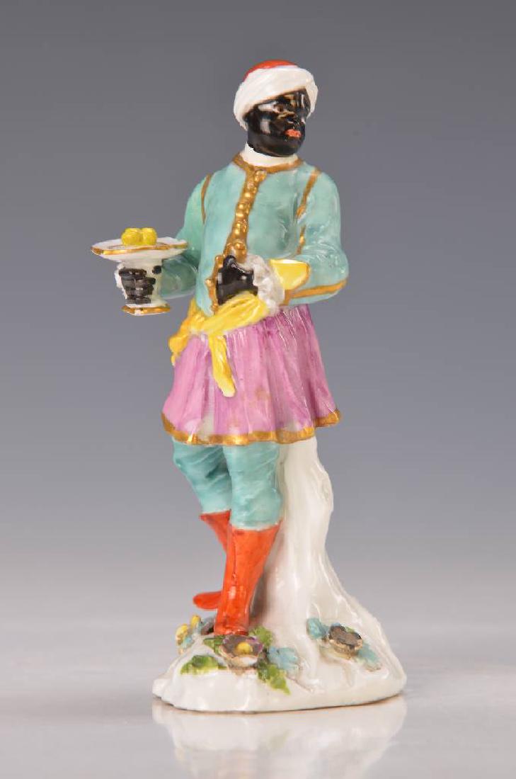 figurine, Meissen: figurine, Meissen, around 1770, Model no. 116 'Mohr', designed by J.J. Kaendler, single figure of the group 'lady with gentleman and Mohr', quality full polychrome painting, flat base with applied flo