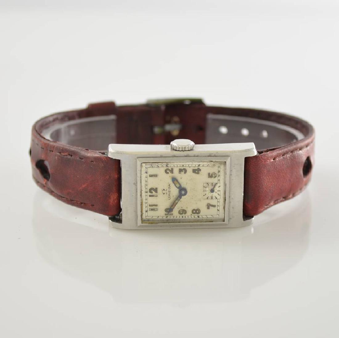 OMEGA rectangular wristwatch calibre T17: OMEGA rectangular wristwatch calibre T17, Switzerland around 1940, manual winding, steel case, snap on case back, original dial due to age spotty, original hands corroded, lever movement in protection