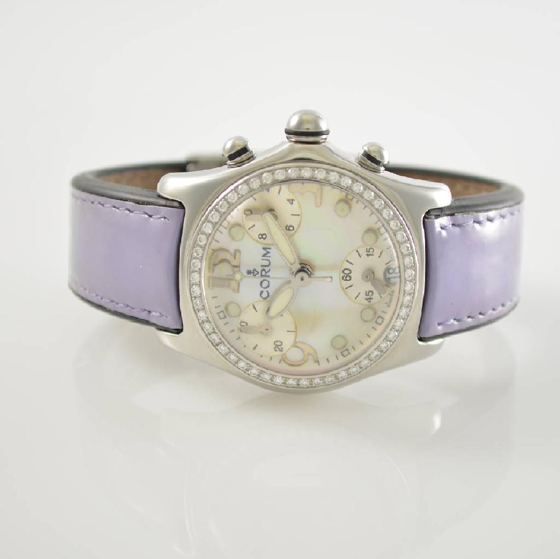 CORUM Bubble chronograph ladies wristwatch: CORUM Bubble chronograph ladies wristwatch in stainless steel, snap on case back, diamond set bezel, mother of pearl dial, raised luminous indexes, luminous hands, quartz, date at 6, curved sapphire c