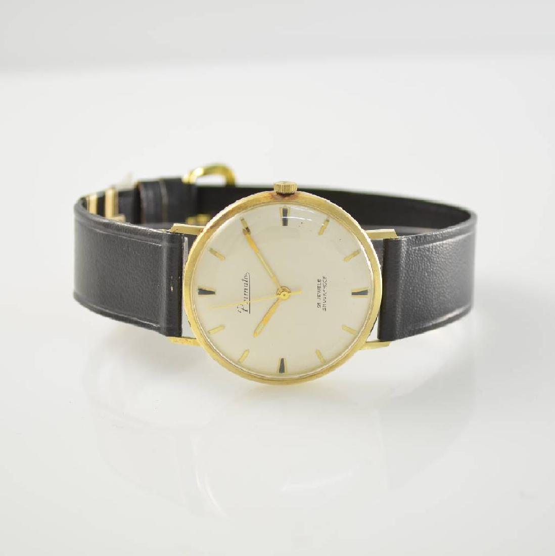 PRIMATO 14k yellow gold gents wristwatch: PRIMATO 14k yellow gold gents wristwatch, around 1960, new old stock, manual winding, snap on case back, silvered dial with raised gilded hour-indexes, gilded hands, rhodium plated movement calibre D