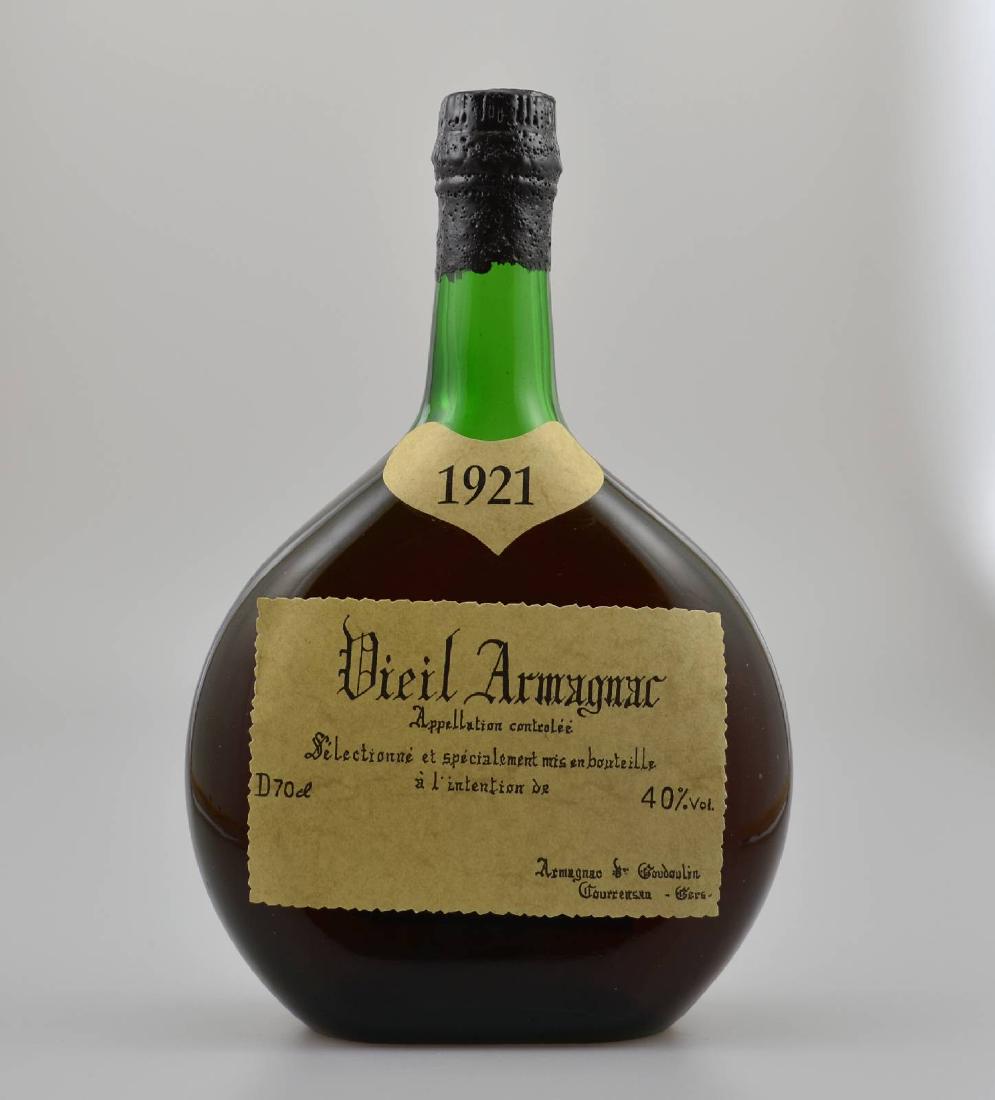 1 bottle 1921 Armagnac: 1 bottle 1921 Armagnac Veuve J. Goudoulin, approx 70 cl, 40 % Vol., distance between capsule and Armagnac approx 5,5 cm, not tasted, very good condition of the bottle, with certificate, rarely on offe
