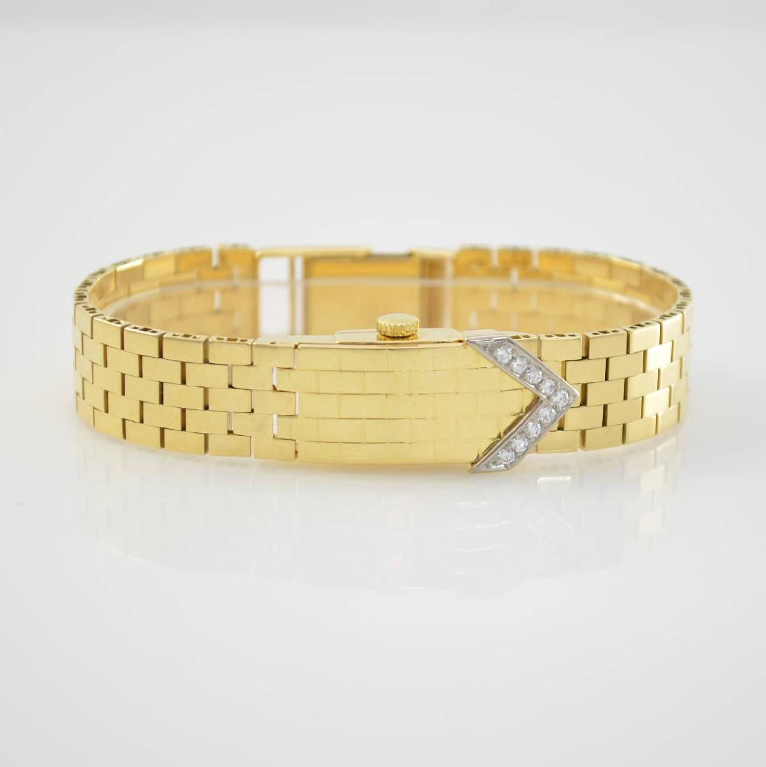 EBEL 18k yellow/white gold ladies wristwatch: EBEL 18k yellow/white gold ladies wristwatch, manual winding, Switzerland for the German market around 1968, protection cap with 9 in white gold set diamonds, snap on case back marked HERVA, dial due