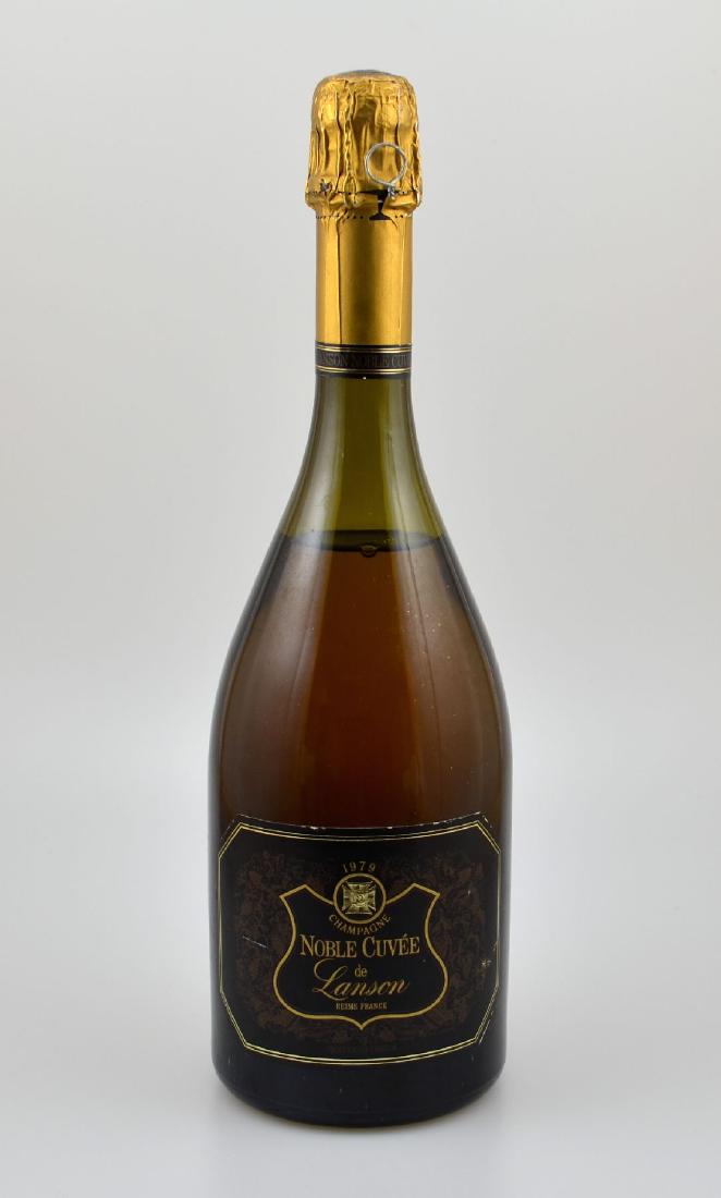 1 bottle 1979 Noble Cuvee de Lanson, approx 75cl,: 1 bottle 1979 Noble Cuvee de Lanson, approx 75cl, distance between bottle bottom and champagne: approx 2,5 cm, label slightly damaged