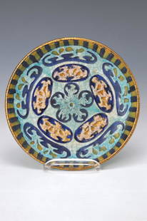 plate, Andre Metthey, 1871 Asnieres- 1920 Laignes: plate, Andre Metthey, 1871 Asnieres- 1920 Laignes, stoneware, around 1910-15, embossment decor, abstract floral, fine craquelure, goldheightened, light blue ground, similar in the Literature, in circl