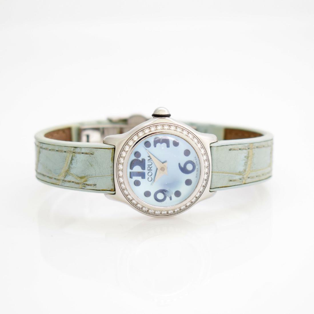 CORUM ladies wristwatch Bubble in stainless steel: CORUM ladies wristwatch Bubble in stainless steel with Diamond set bezel, Switzerland around 2006, made in a limited special edition of 100 pieces, quartz, snap on case back, extreme curved sapphire c