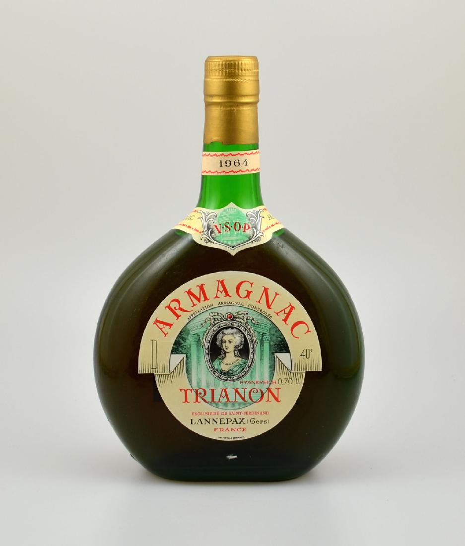 2 bottles of 1964 Armagnac, Trianon, Lannepax,each: 2 bottles of 1964 Armagnac, Trianon, Lannepax,each approx 70 cl, 40 % Vol., distance between capsule and Armagnac: approx 4,5 cm, good condition of the bottles, not tasted