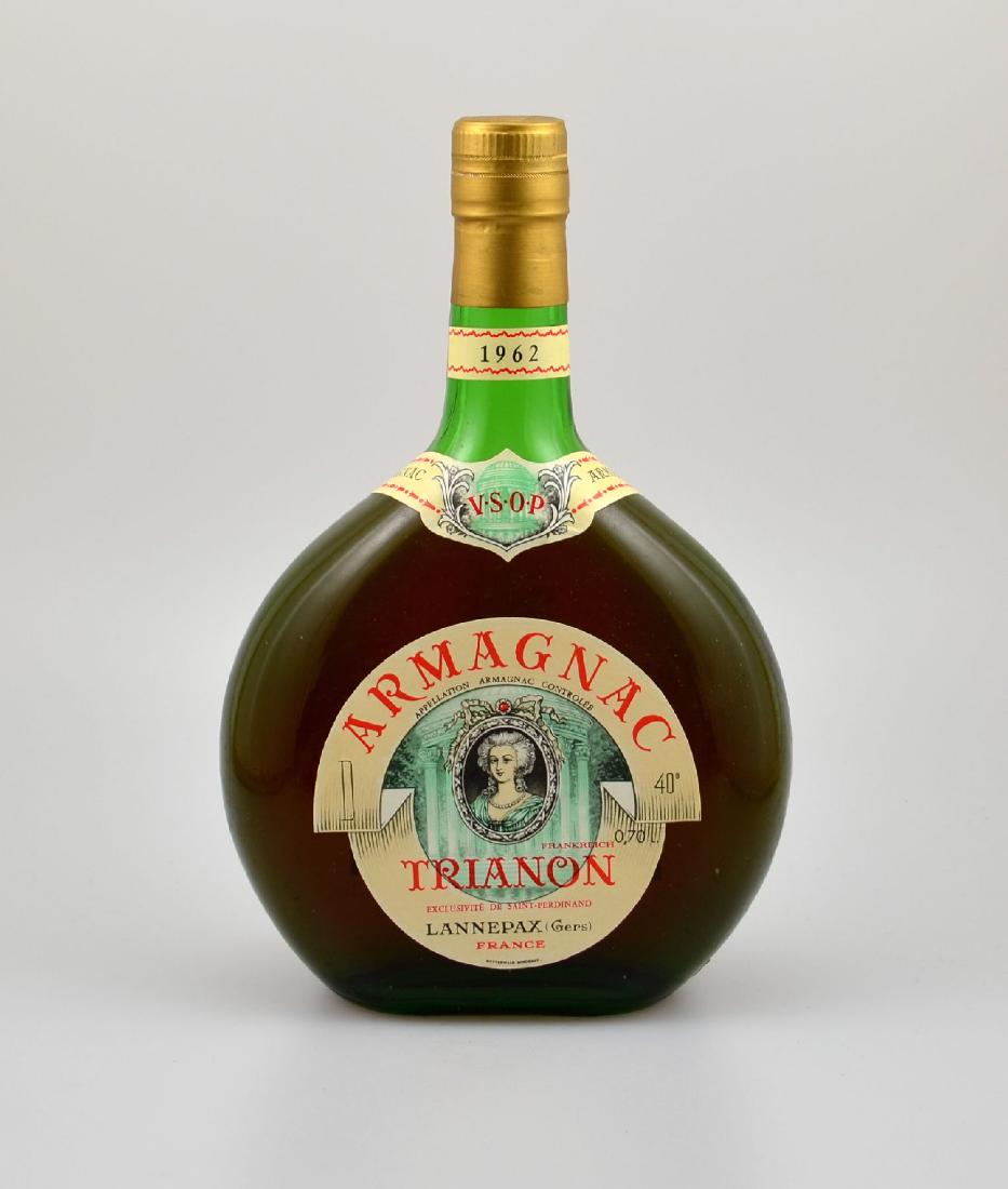 3 bottles of 1962 Armagnac, Trianon, Lannepax, each: 3 bottles of 1962 Armagnac, Trianon, Lannepax, each approx 70 cl, 40 % Vol., distance between capsule and Armagnac : approx 4,5 cm, good condition of the bottles, not tasted