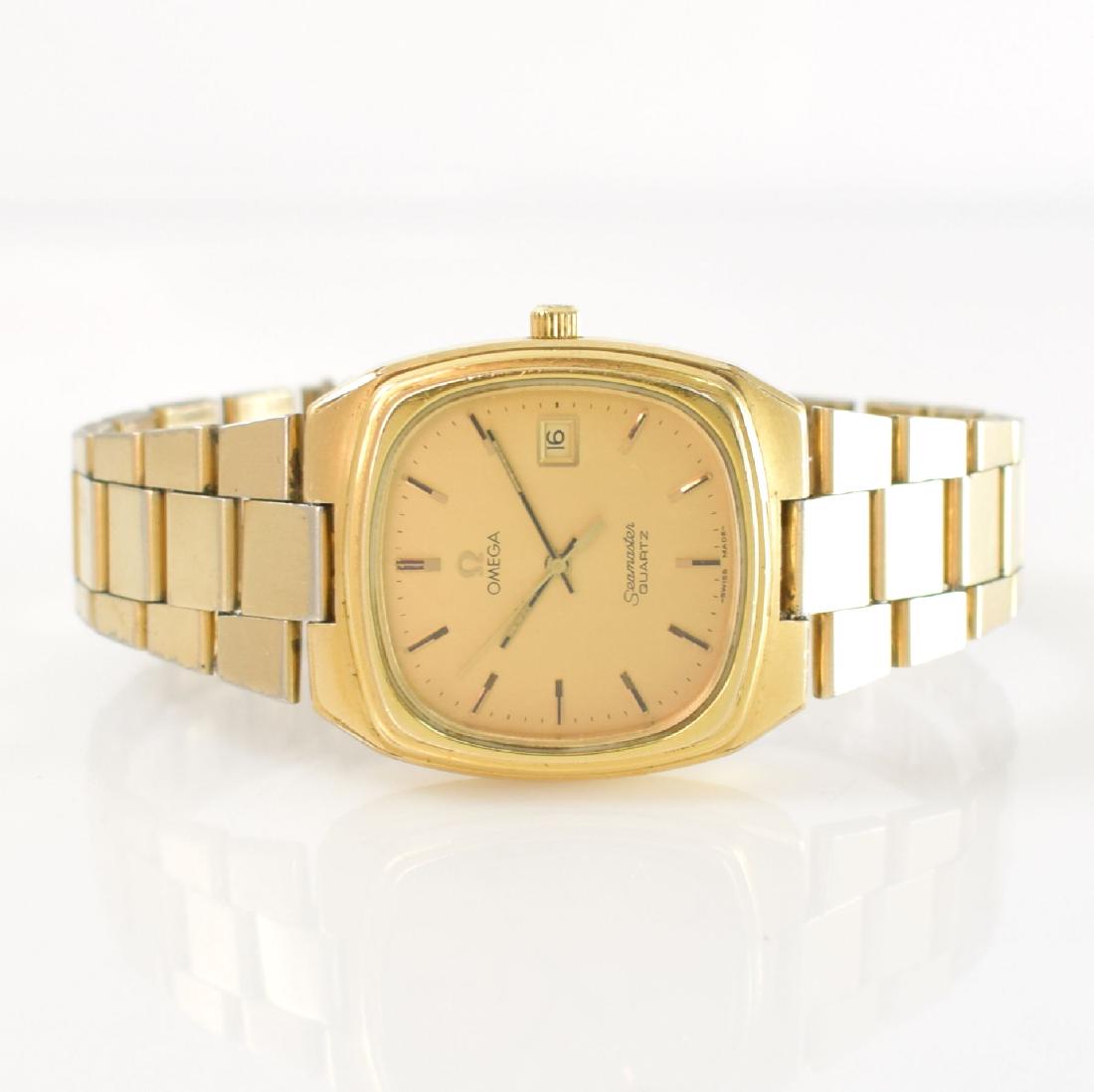 OMEGA Seamaster gents wristwatch around 1979: OMEGA Seamaster gents wristwatch, Switzerland around 1979, quartz, gold-plated case including original bracelet with deployant clasp, snap on stainless steel case back, gilded dial with raised gilded 